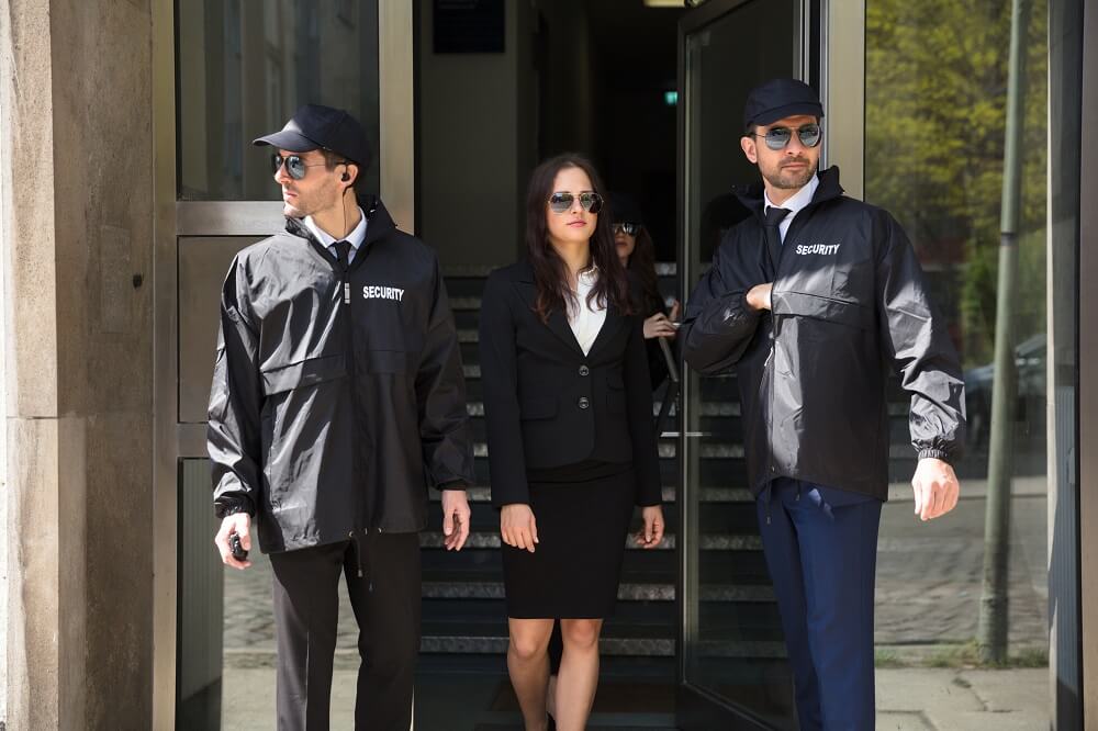 Two of our security guards securing one of our business clients